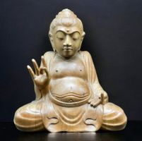 Statue de bouddha en bois sculpté assis en position du lotus