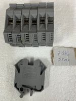 7 Woertz-Klemmen 3304, 16 mm2 grau, für G-Schiene, gebraucht