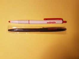 Märklin 2 stylos publicitaires, 1 x noir, 1 x blanc 13,5 cm.