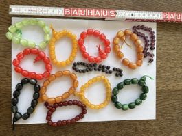 Lotto di 12 braccialetti vintage in resina/plastica colorata