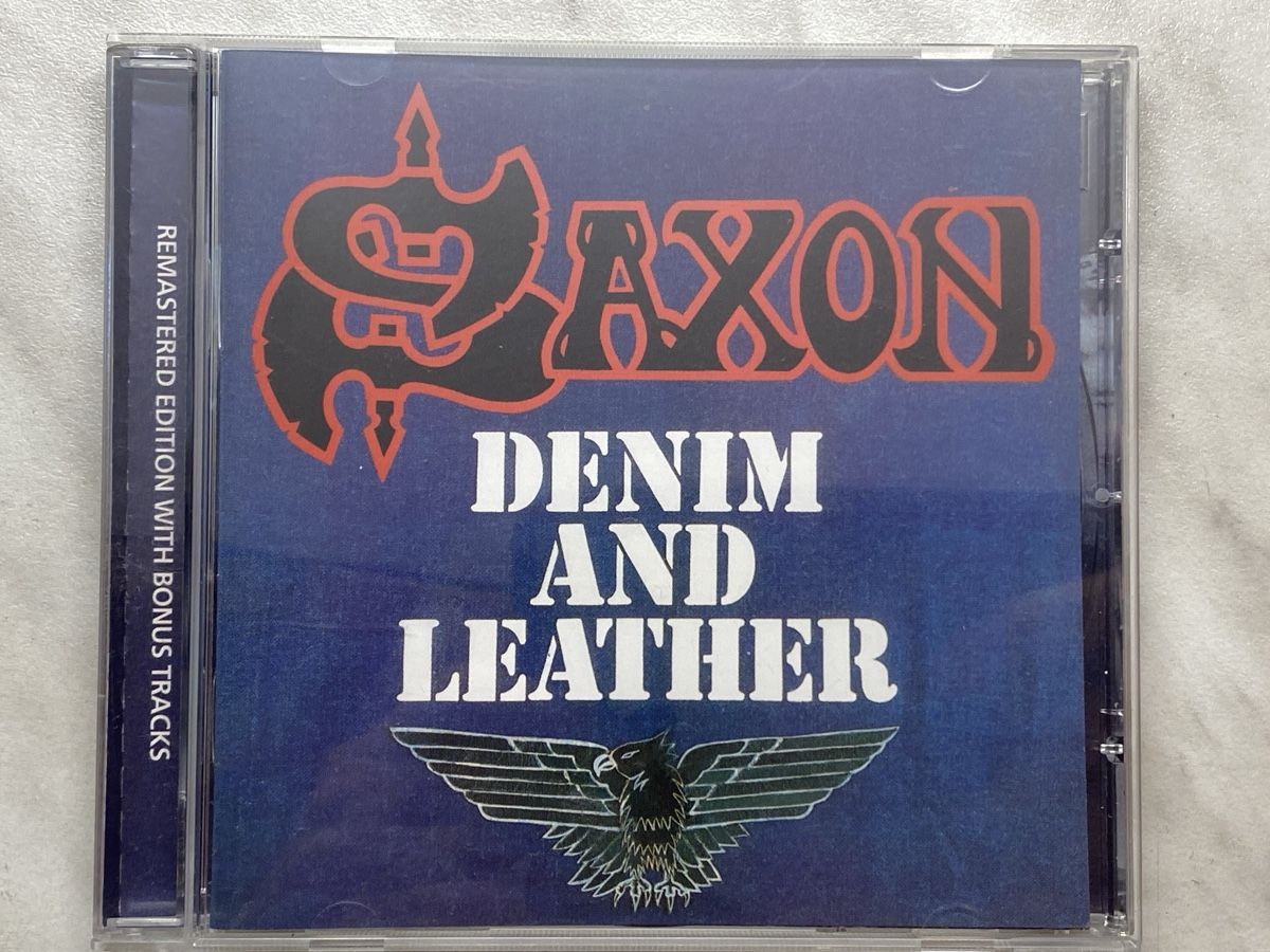 CD: Saxon - Denim And Leather - CD Remaster – Nuovo (secondo la descrizione) da Aigle venduto da St_anger