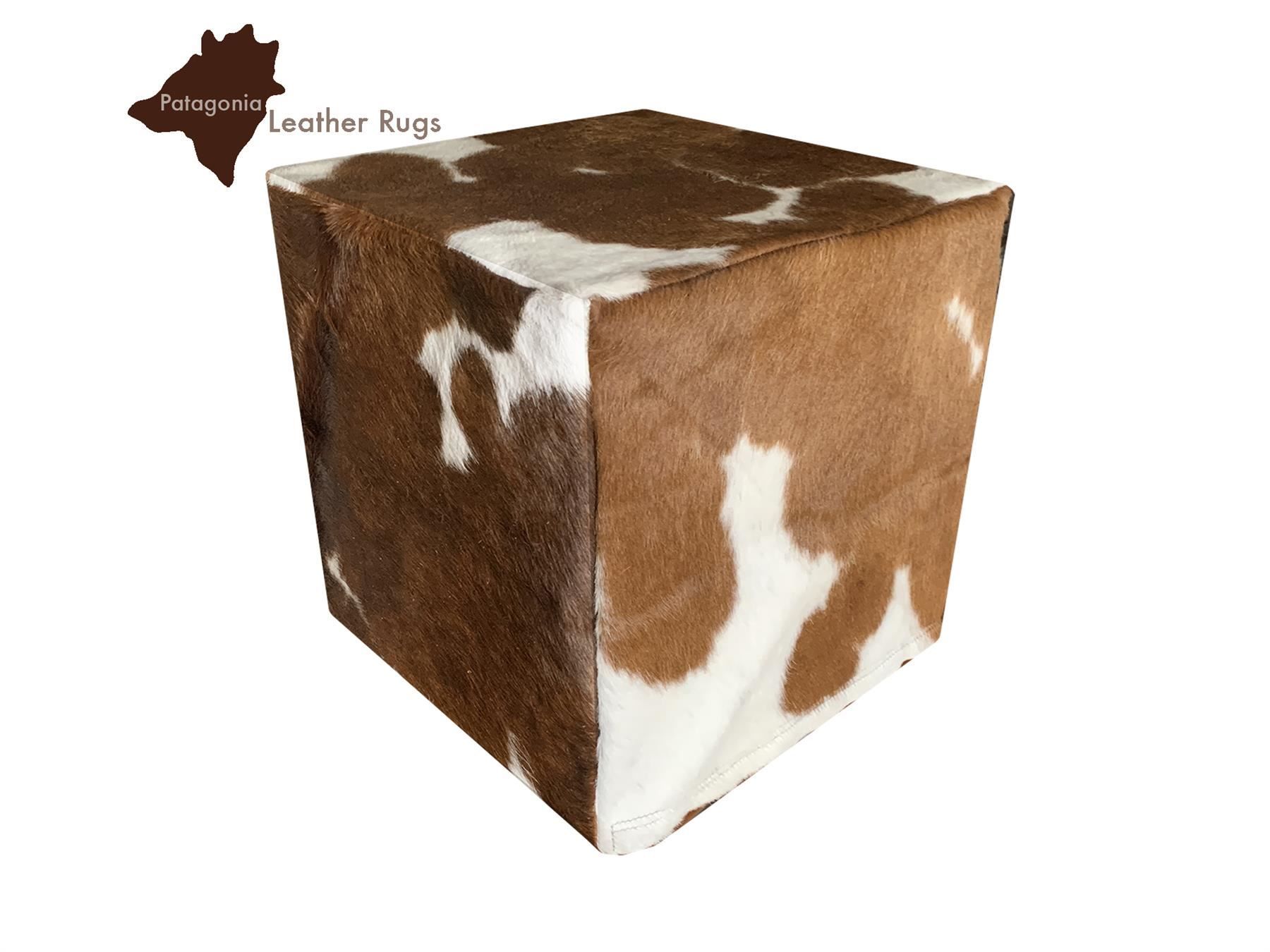 Sgabelli: Kuhfell Hocker Brown/White – Nuovo e nell'imballaggio originale da Arbedo venduto da patagonialeatherrugs 1