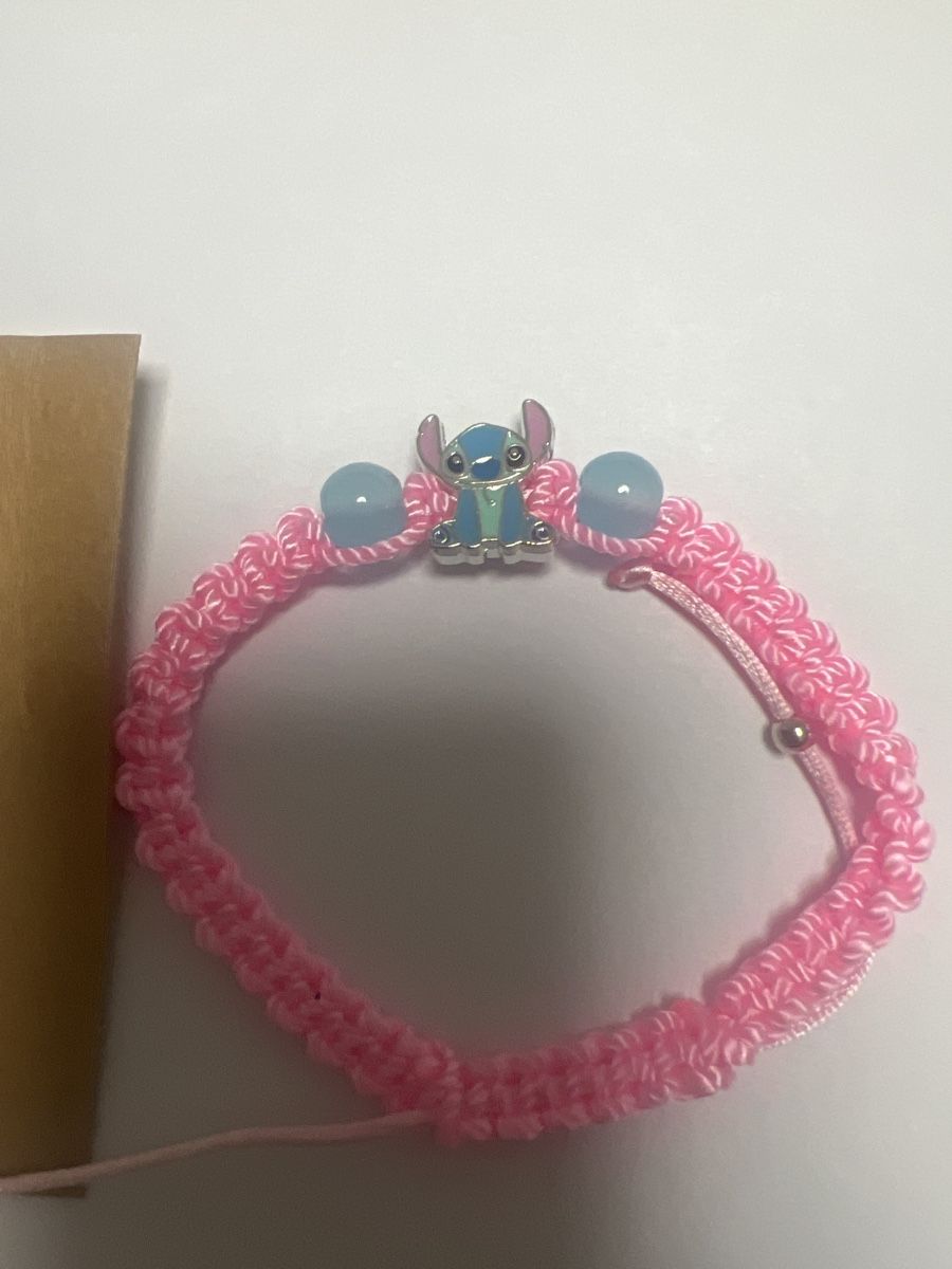 Bracelets: Bracelet rose  Stitch, – Neuf avec emballage d'origine à Chenens par anasantos90 2