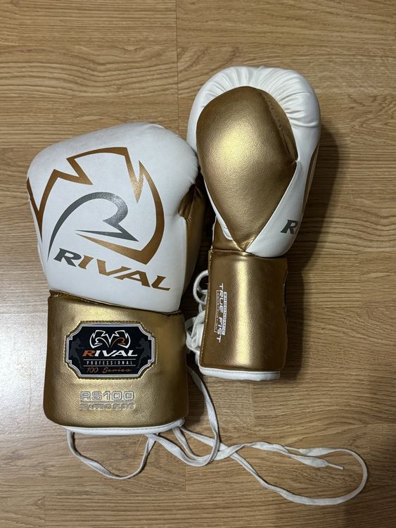Rival RS100 white/gold 18oz boxing gloves (Gebraucht) in Péry für CHF ...