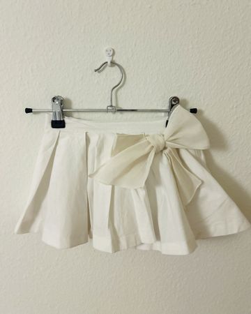 Mini-jupe blanche/écri, La Formiga 3A avec noeud,