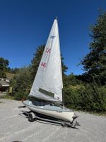 Segeljolle Finn mit Slipwagen und Strassentrailer