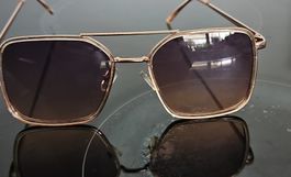 Sonnenbrille Damen Gold Stilvoll für den Sommer