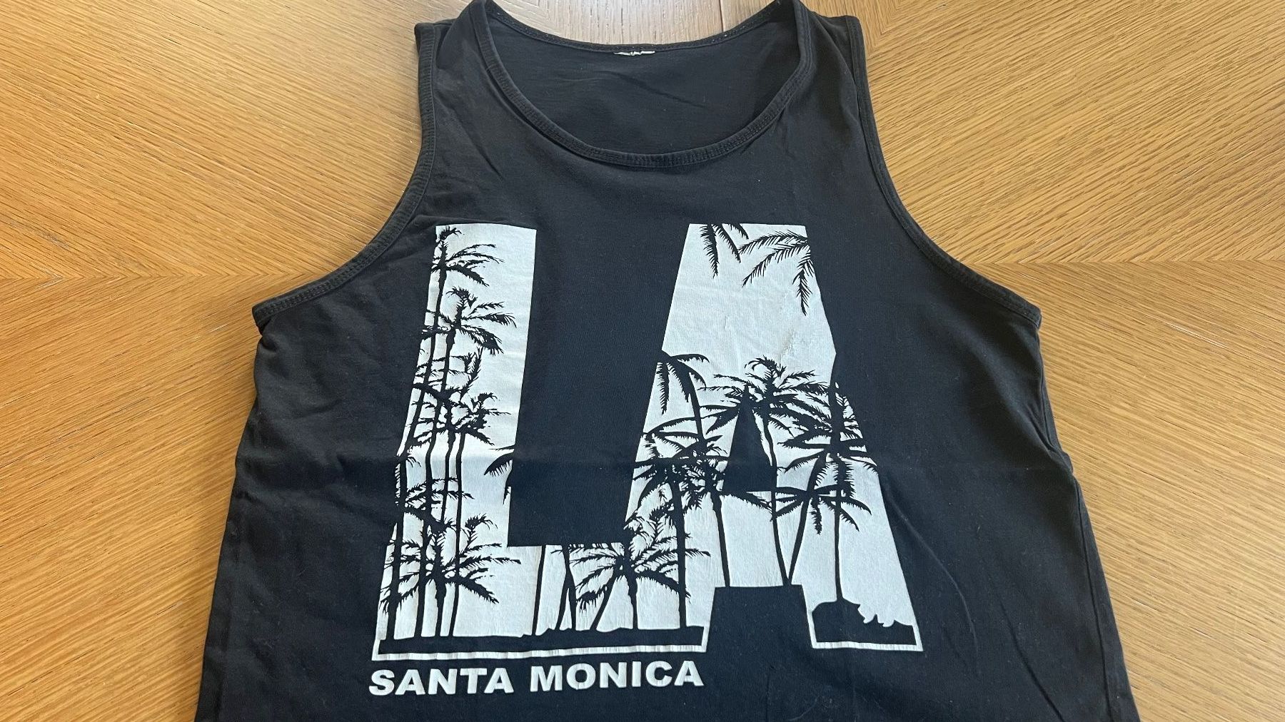 Top: Schwarzes Tanktop  mit "LA Santa Monica" M – Usato da Schübelbach venduto da Dolly990_2 1