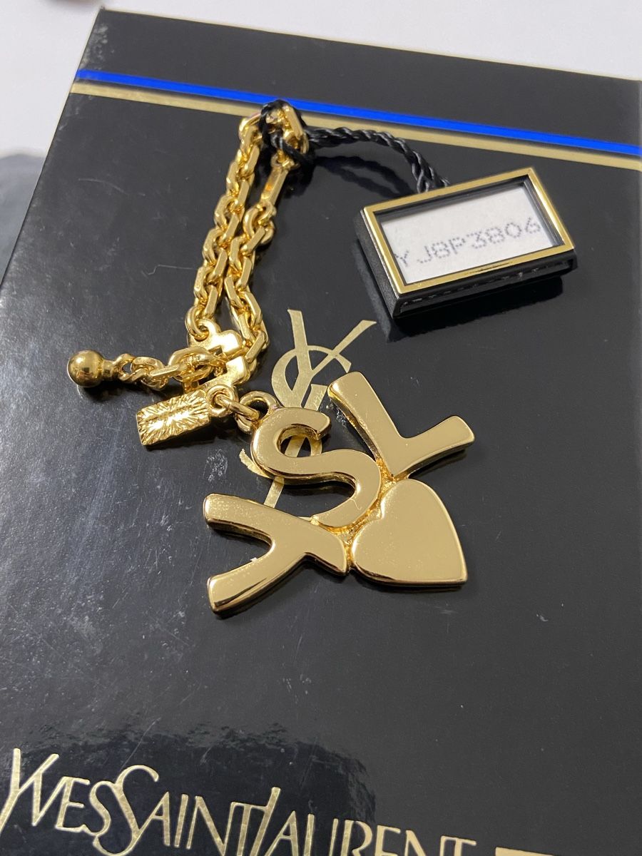 Saint Laurent Ciondoli: Bijoux de sac Yves Saint Laurent – Usato da Montreux venduto da Perledor 7