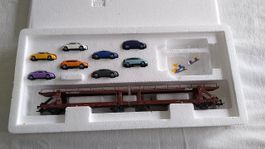 Trix H0 Autotransportwagen 23974 mit 8 Audi  Modelle