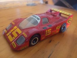 Spielzeugauto Porsche 962 rot mit 15 Aufdruck