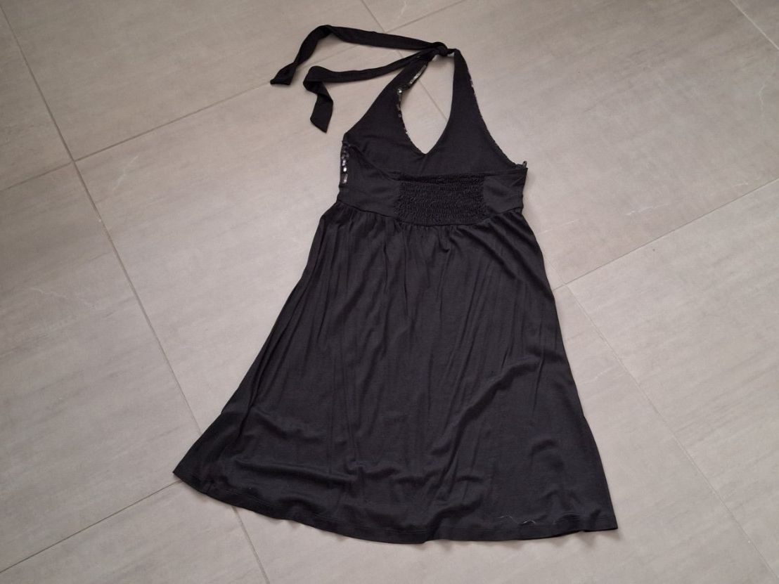 H&M Top: Schwarzes H&M Pailletten-Top Gr. 36 – Usato da Märstetten venduto da activemember 2