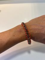 Strassarmband in braun mit orange