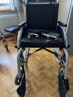 Rollstuhl mit Sitzkissen 