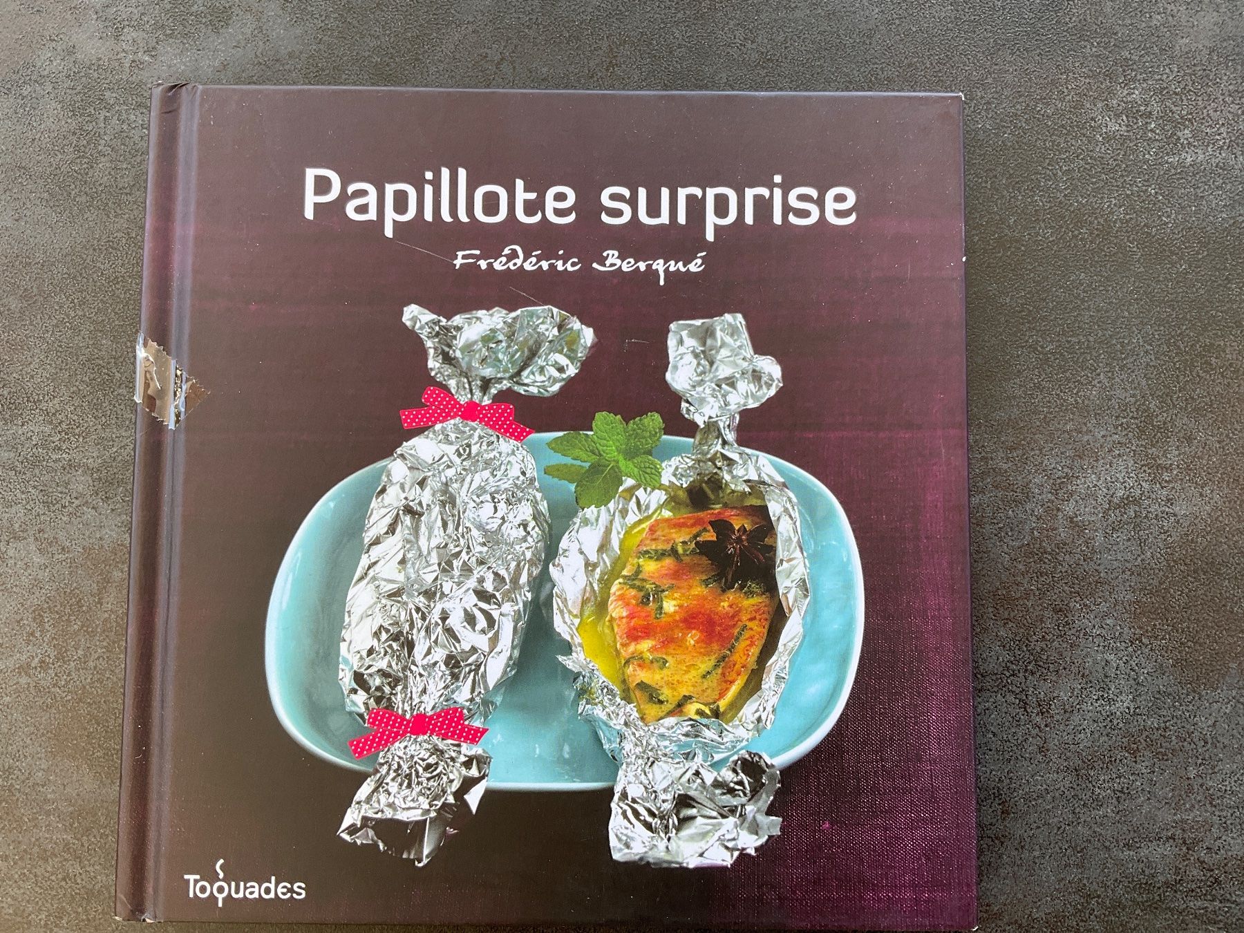 Livres: "Papillote surprise" Frédéric Berqué – D'occasion à Avenches par Lactobacille