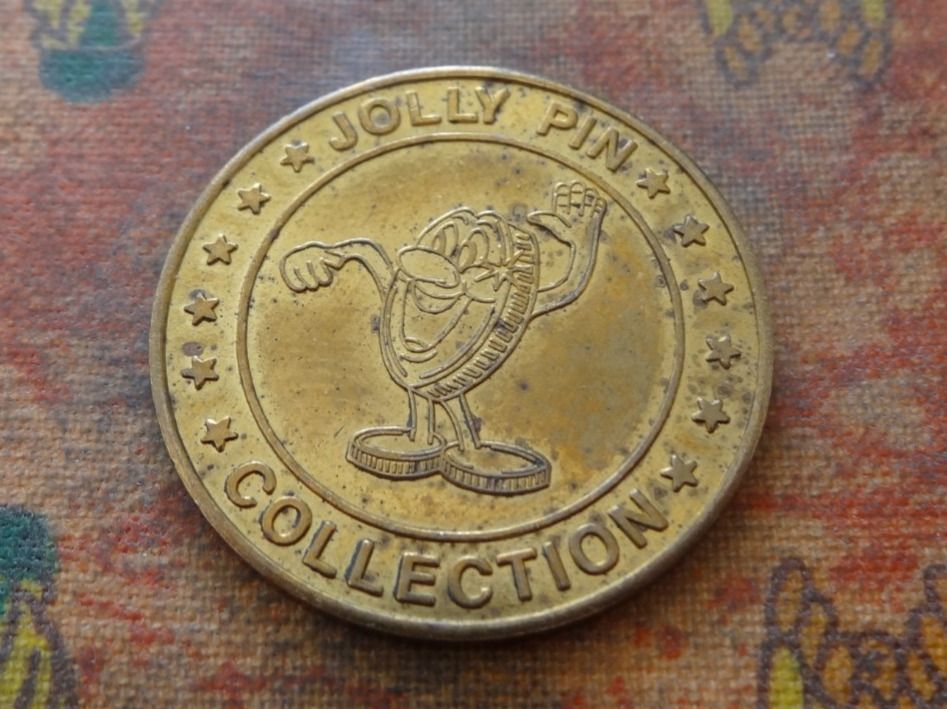 Tutti le monete: Jeton  " JOLLY  PIN  COLLECTION "  (M) – Usato da Romanel-sur-Lausanne venduto da Swift13 1