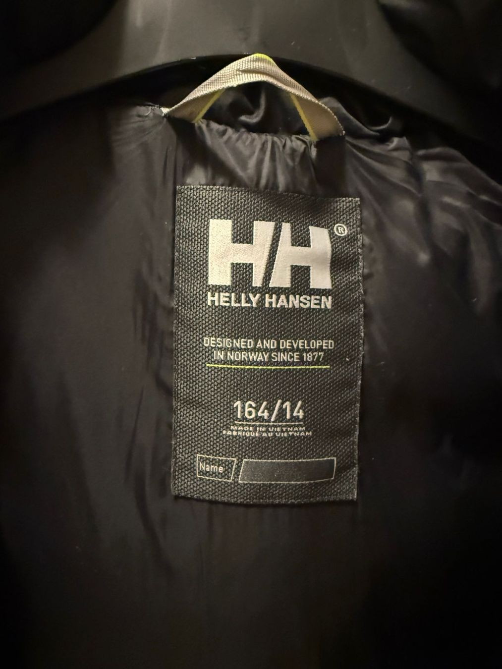 Helly Hansen Giacche: Helly Hansen Winterjacke, Grösse 164/14, Gold/Schwarz – Usato da Thun venduto da Sde 1