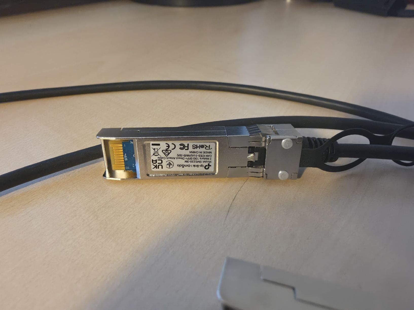 TP-Link Cavi: TP-Link 10G SFP+  Direct Attach Cable (DAC) - 3 Meter – Usato da Biberist venduto da Volo28 1