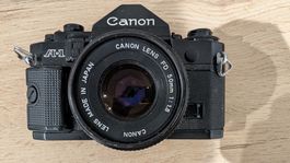 Canon A-1 film camera + Canon FD 50mm f/1.8 lens