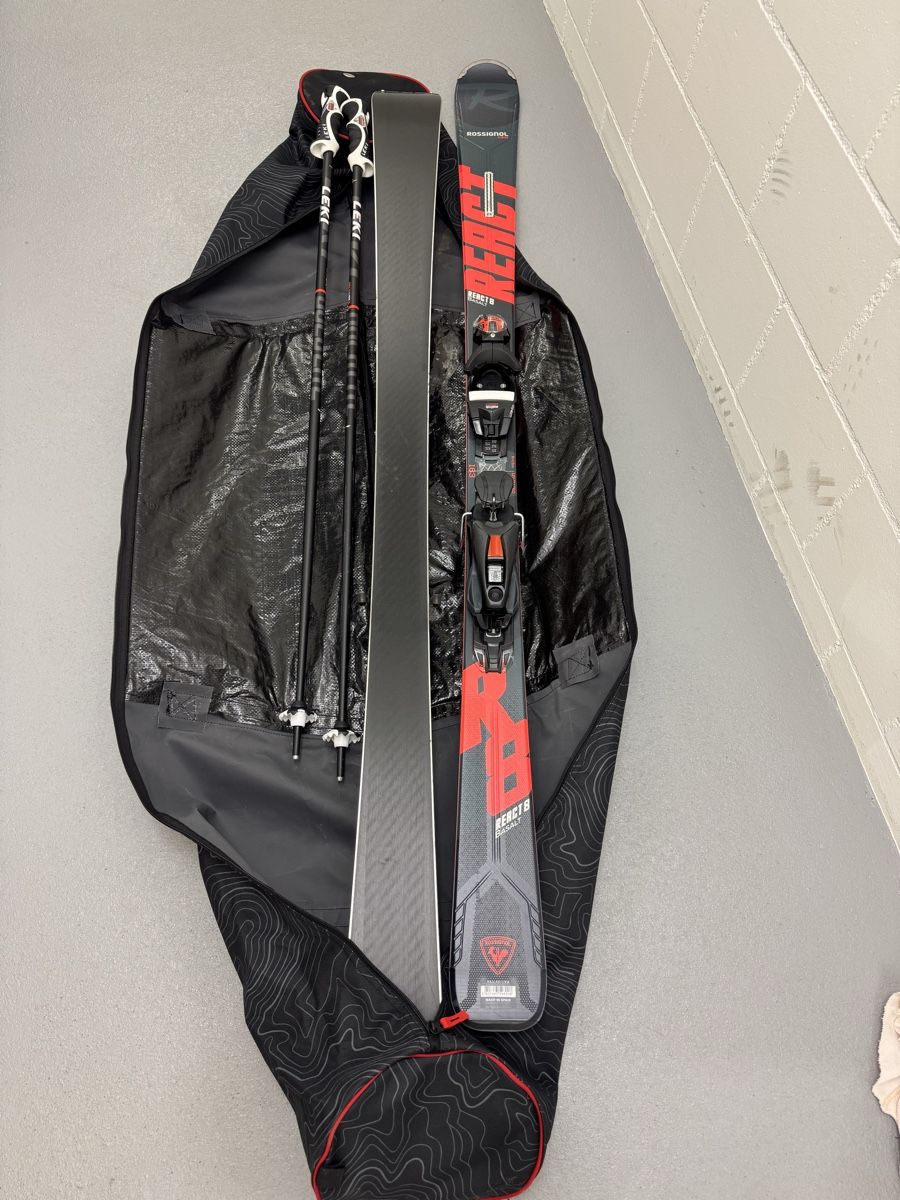 Rossignol Skis: Ski Rossignol React 163cm mit Stöcken und Tasche – D'occasion à Unterseen par mma_xj6w