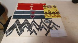 Diverse Armbinden  und Gradabzeichen zum Teil aufgeklebt