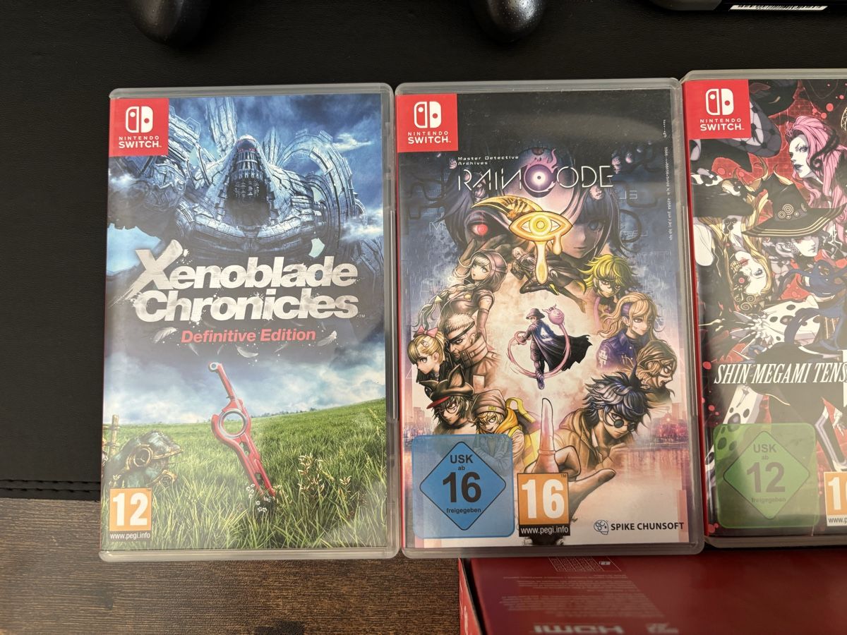 Nintendo Console: Nintendo Switch mit diversen Spielen und zwei pro Controller – Usato da Ipsach venduto da seb_2p9q 2