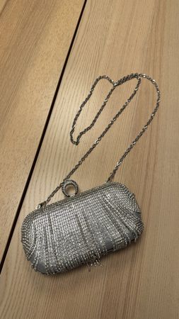 Elegante silberne Mascara Abendtasche