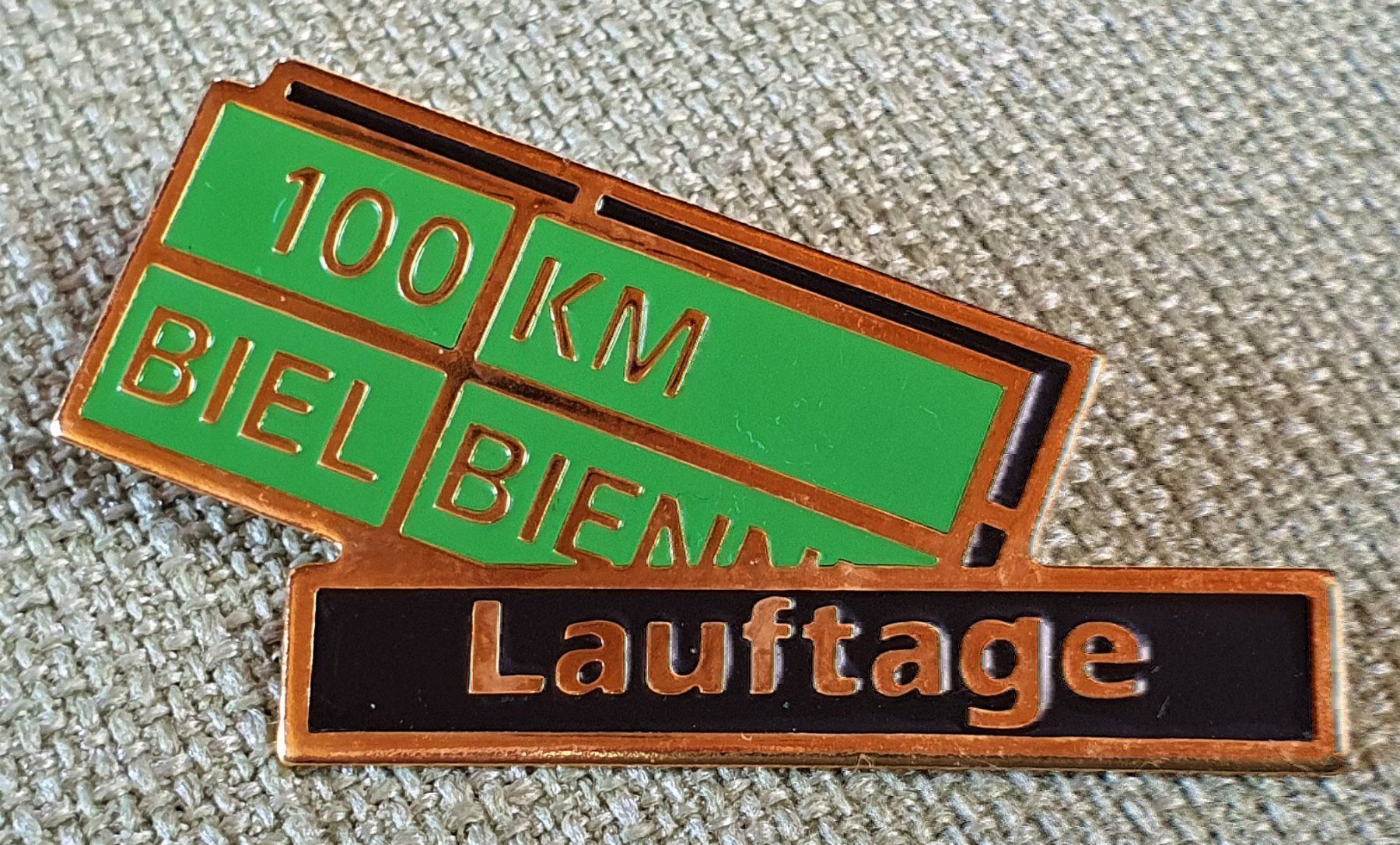 Medaglie: C198 - Pin 100 KM Biel Bienne Lauftage – Usato da Reinach BL venduto da Boston-Verkauf