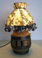 Lampe aus Wagenradnabe.