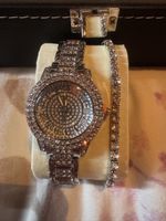 Montre femme argentée avec strass et bracelet assorti