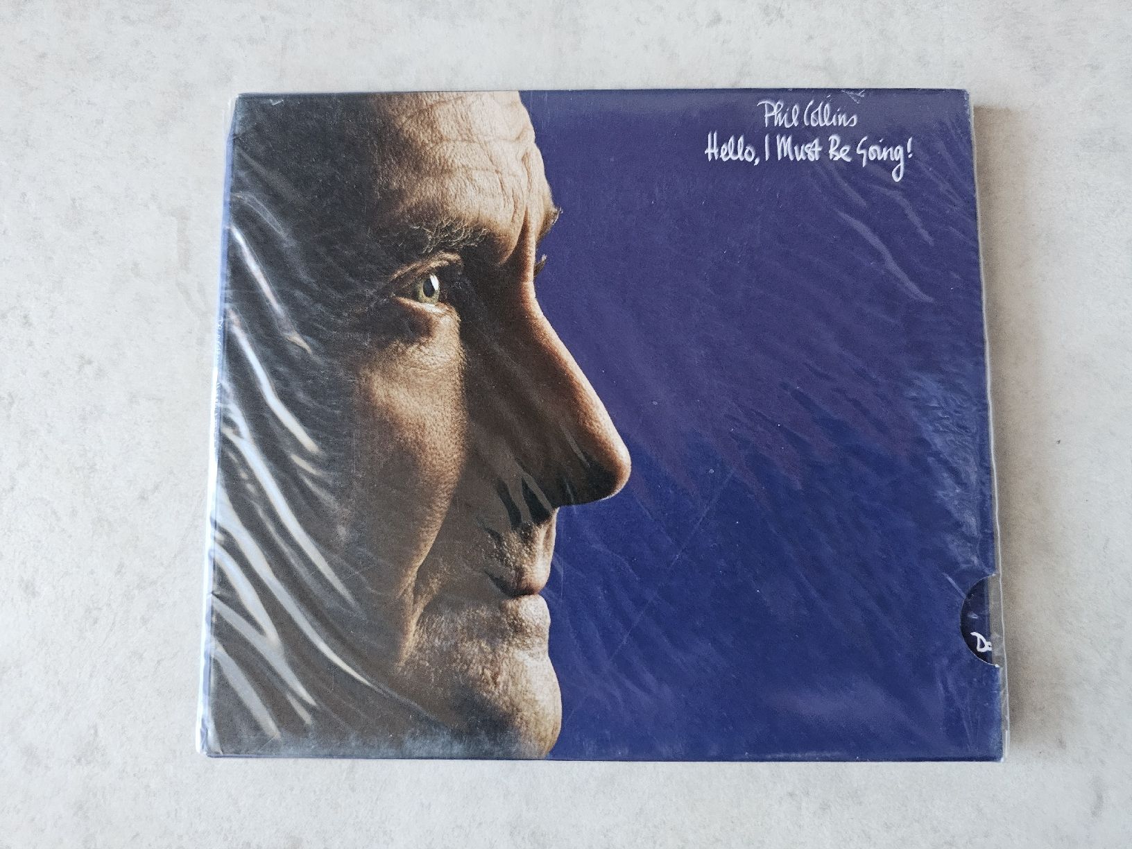 CD: Phil Collins  -  Hello, I Must Be Going / Deluxe Fabriknei – Nuovo e nell'imballaggio originale da Schneisingen venduto da backstore24