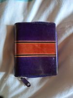 Portefeuille violet et orange