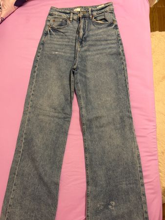 Pantalon jean H&M bleu taille 36 en bon état occasion