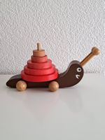 Holzspielzeug Schnecke: Stapelturm für kleine Entdecker!