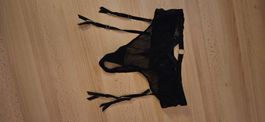 string porte jaretelles comme neuf (DR)