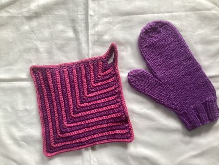 Topflappen und Backhandschuh