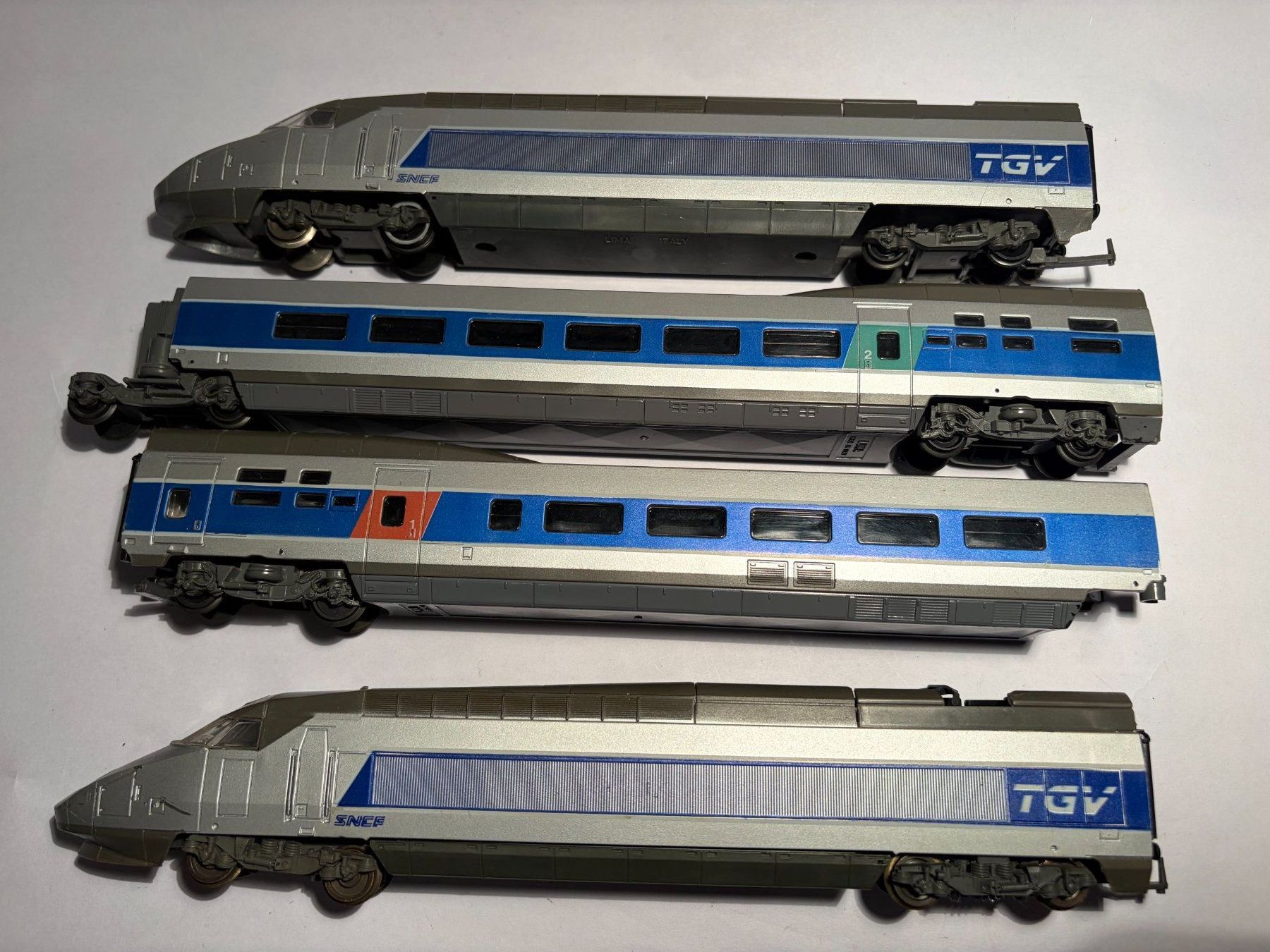 Lima Modellini di ferrovie: Lima TGV grau Komposition 4 teilig, DC Analog – Usato da Buchrain venduto da Modellbahn11 2