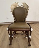 Sedia con pale di daino e corna di cervo