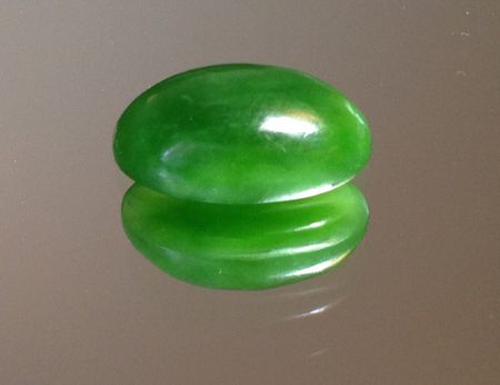 Emerald green polar jade nephrite cabochon 16x10.5x5.8 mm