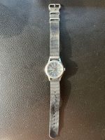 Montre Timex vintage unisexe - look intemporel et robuste!