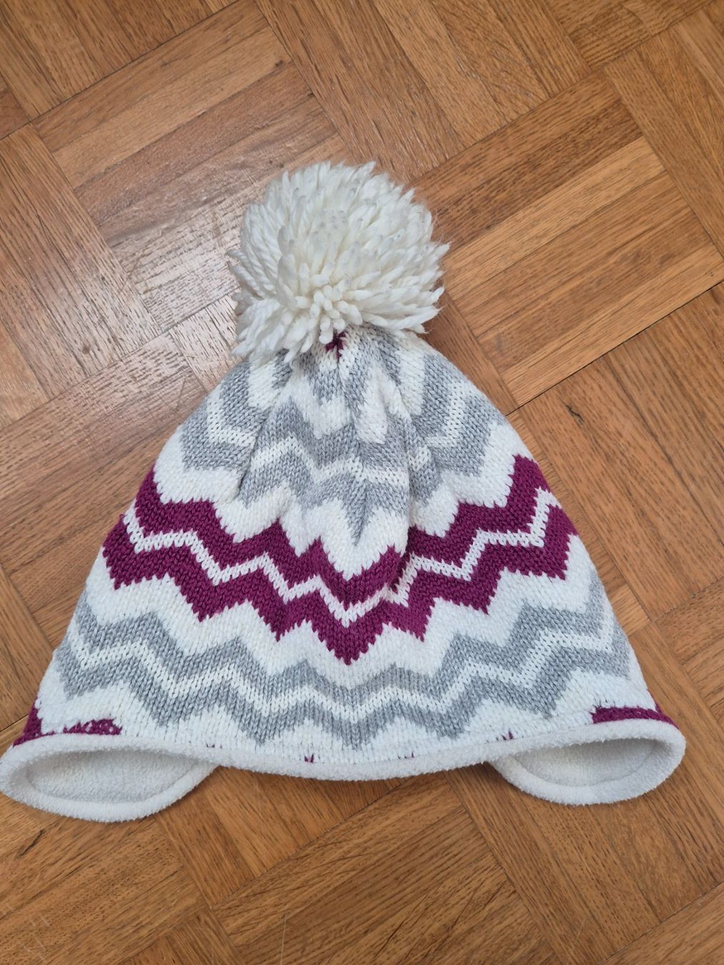Altro abbigliamento per bambina: Kindermütze mit Bommel, weiss/grau/violette  Eisbär – Usato da Dietikon venduto da grafad 1