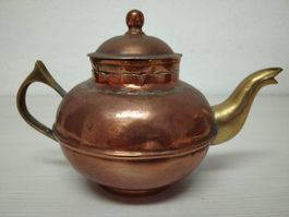 Pentola e caraffa in rame