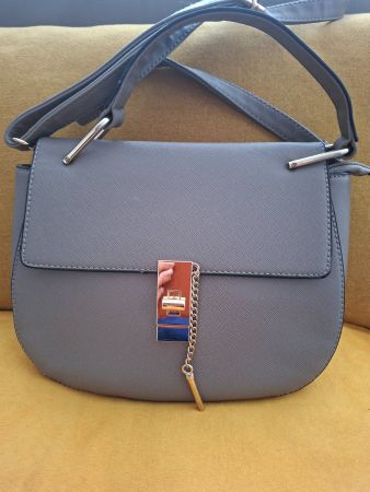 Sac bandoulière gris fermeture cadenas neuf