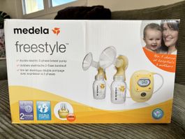 Medela Freestyle elektrische Milchpumpe mit viel Zubehör