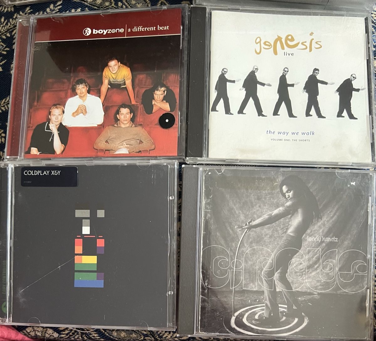 CDs: CD Boyzone Genesis Coldplay Lenny Kravitz – Gebraucht aus Basel von Caramelbonbon