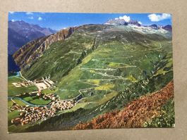 AK Vogelschau auf Andermatt mit Oberalp Pass Strasse 1963