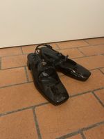 Black patent faux leather Mary Jane shoes 