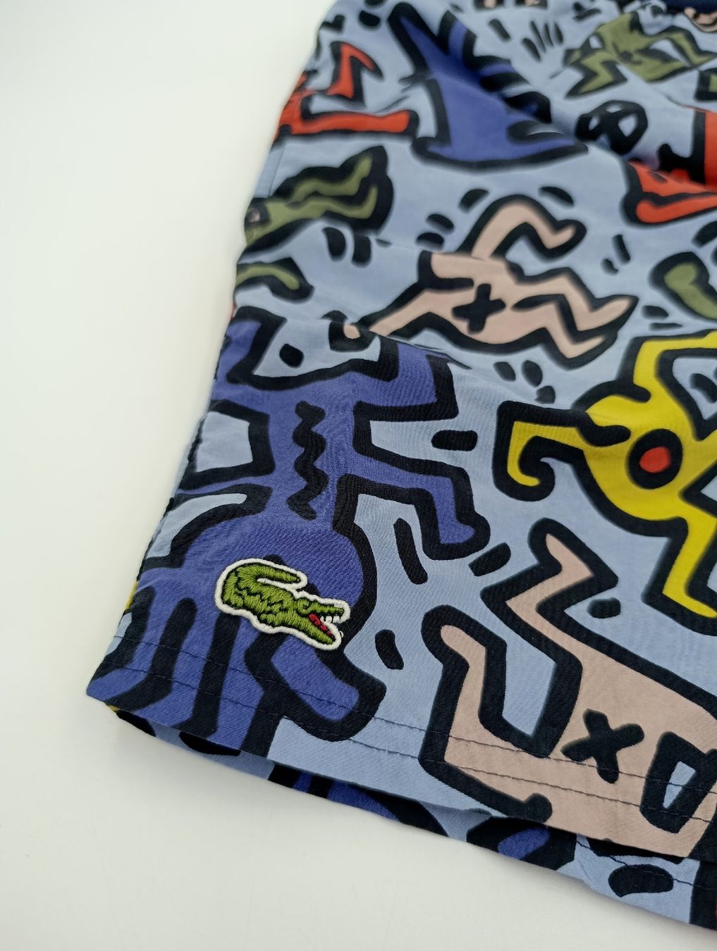 Lacoste Hosen: Lacoste x Keith Haring Badehose, Grösse M – Gebraucht aus Wil SG von Donaldus 2
