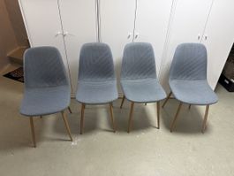 Lot de 4 chaises grises a pieds en métal bon état 