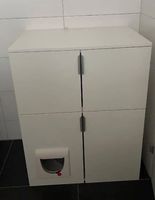 Kommode mit integrierter Katzenklappe